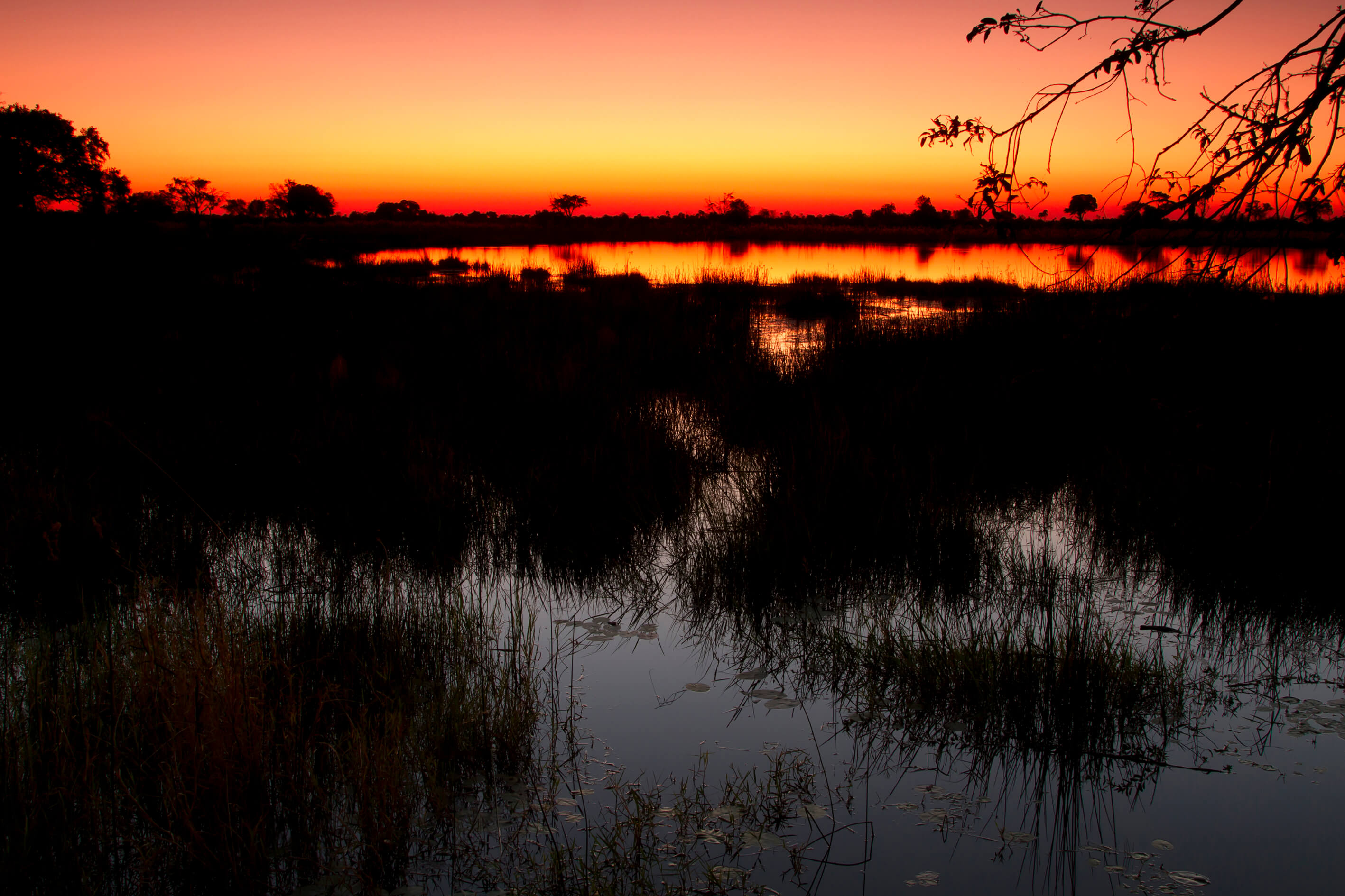 Zonsondergang boven de Okavango Delta Botswana
