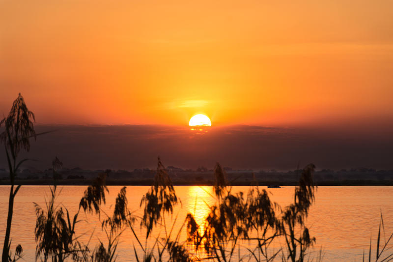 Zonsondergang bij Marelli Islands Malawi (© Athira Mohan)