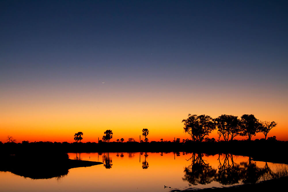 Betoverende zonsondergang Okavango Delta Botswana